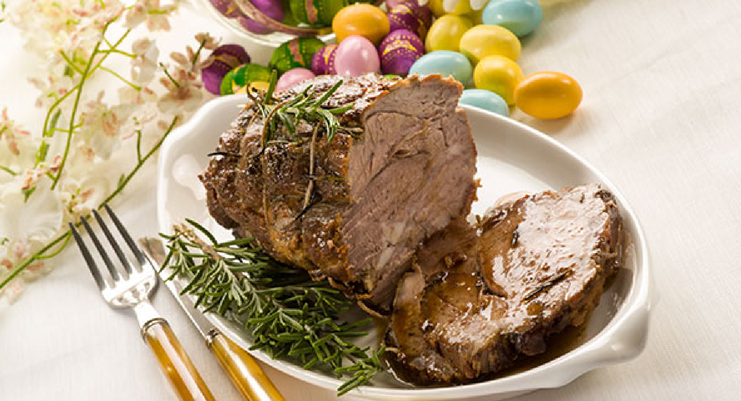 Easter dinner spread with ham, green beans, sweet potatoes, salad and apple pie
