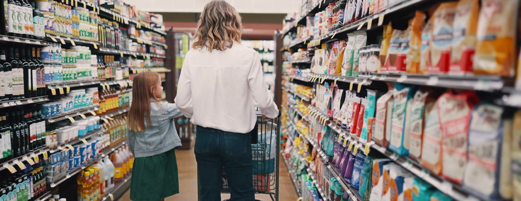 mother and daughter shopping for groceries